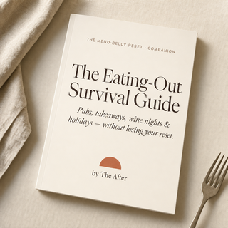 The Eating-Out Survival Guide booklet on a pale wood table in soft morning light — the real-life companion to The Meno-Belly Reset
